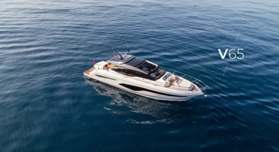 "Princess-V65" Bird's-eye view of the luxurious yacht Princess V65 gliding on serene blue waters.