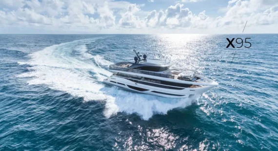 "princess-X95" Luxurious yacht Princess X95 navigating through open waters, with waves crashing around its bow.